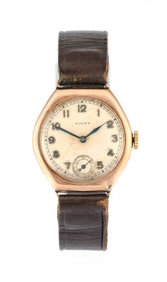 Lot 2143 - Rolex: A 9 Carat Gold Tonneau Shaped...