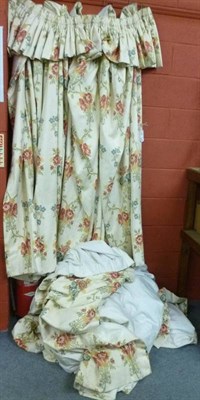 Lot 799 - Two pairs of cream, gold, pink and blue floral lined curtains with pelmets