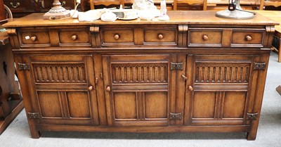 Lot 1181 - A Titchmarsh and Goodwin Oak Sideboard, with...