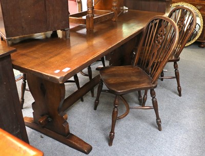 Lot 1173 - A Titchmarsh and Goodwin Oak Refectory Dining...