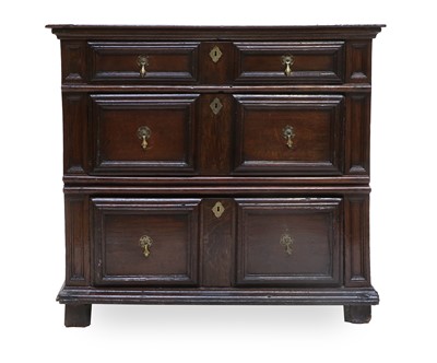 Lot 697 - An Oak Geometric-Moulded Straight-Front Chest...