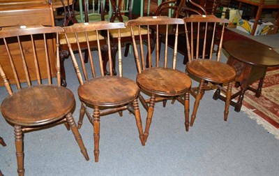 Lot 812 - Six spindle back chairs and an occasional table