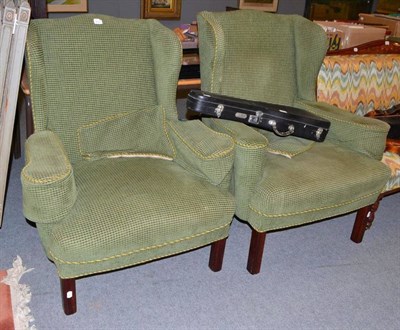 Lot 813 - A pair of Georgian style green upholstered wing armchairs