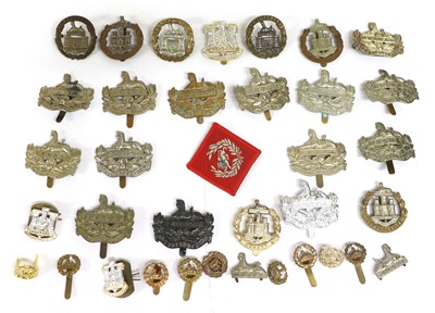 Lot 122 - Seven Bimetal Cap Badges to the Dorsetshire...