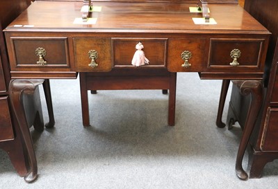 Lot 1206 - A Walnut and Mahogany Dressing Table by Waring...