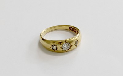 Lot 279 - An 18 Carat Gold Diamond Three Stone Ring, the...