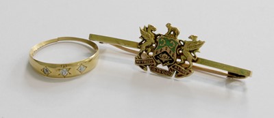 Lot 252 - A 9 Carat Gold Enamel Brooch, the motto...