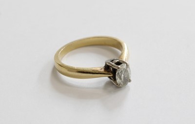 Lot 225 - An 18 Carat Gold Diamond Solitaire Ring, the...