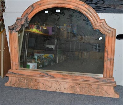 Lot 831 - A modern pink marble overmantel mirror