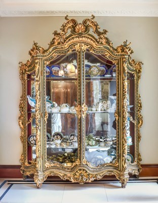 Lot A French Louis XV-Style Carved Giltwood...