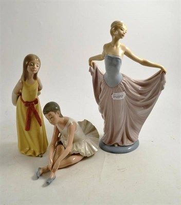 Lot 3 - Two Lladro figures of ladies and a Nao ballet dancer figure (3)