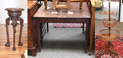 Lot 1293 - A Carved and Stained Beech Torchere, the...