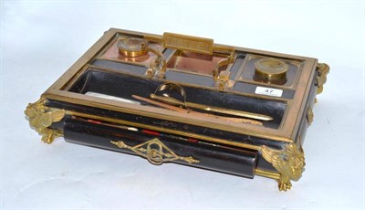 Lot 47 - Victorian ebonised and brass mounted inkstand, silver paper knife and four others