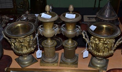 Lot 49 - Pair of gilt metal twin handled pedestal vases and pair of loaded pedestal vases with rams head...