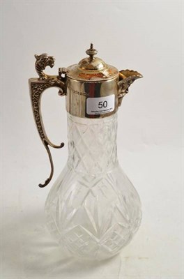 Lot 50 - A cut glass claret jug with silver mount, cover and handle, Sheffield 1978
