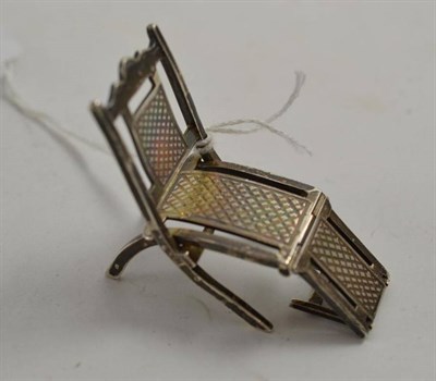 Lot 60 - A sterling folding steamer chair by Howard & Co.