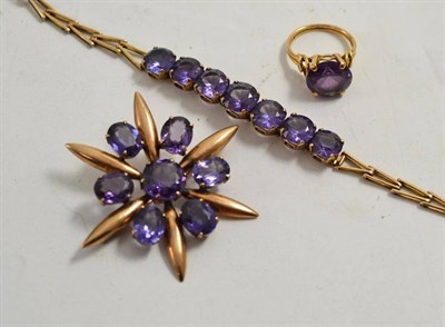 Lot 64 - A line bracelet, a spray brooch and a solitaire ring, all set with synthetic sapphire...