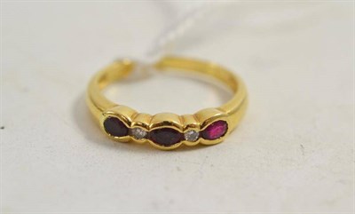 Lot 69 - An 18ct gold ruby and diamond ring
