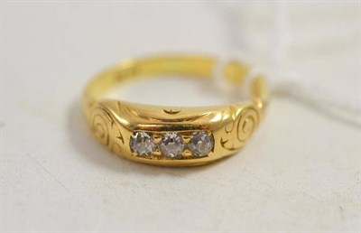 Lot 70 - A Victorian diamond three stone ring, stamped '18CT'