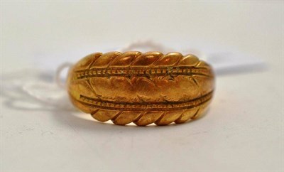 Lot 75 - An 18ct gold ring, Birmingham assay, no date letter