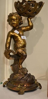 Lot 86 - A large gilt metal table lamp modelled as a putto with dolphin