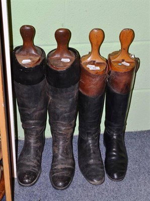 Lot 89 - A pair of black leather hunting boots and wooden trees, another pair with brown tops