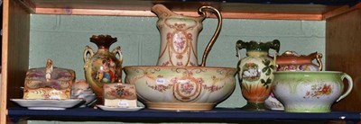 Lot 93 - A shelf of decorative ceramics including Crown Devon Fieldings toilet ewer and basin,...
