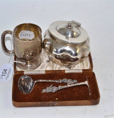 Lot 104 - Lobed and hinged silver tea caddy (marks rubbed), cased silver plated child's spoon and pusher 'Cat