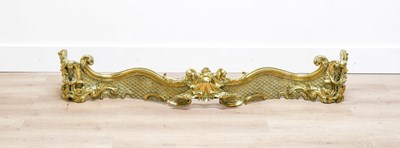 Lot 74 - A Louis XV-Style Gilt-Brass Serpentine Fire...