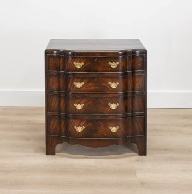 Lot 42 - A Walnut and Crossbanded Serpentine Dressing...