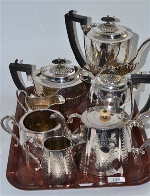 Lot 136 - A silver plated five piece tea and coffee service and a three piece tea service