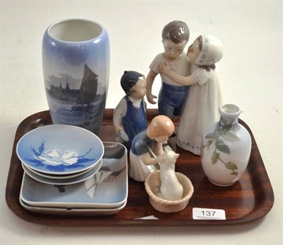 Lot 137 - Three Royal Copenhagen figures of children, five dishes and two vases