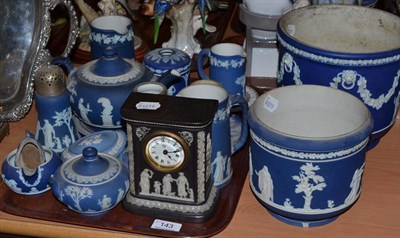 Lot 143 - Black Jasperware Wedgwood mantel clock, Wedgwood blue Jasperware jugs, trinket boxes etc and...