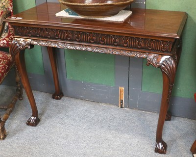 Lot 1244 - A Reproduction Carved Mahogany Console Table,...