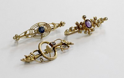 Lot 294 - Three Brooches, comprising of an amethyst and...