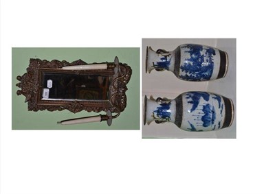 Lot 189 - Metal mounted wall mirror with brass sconces and a pair of Japanese blue and white pottery vases