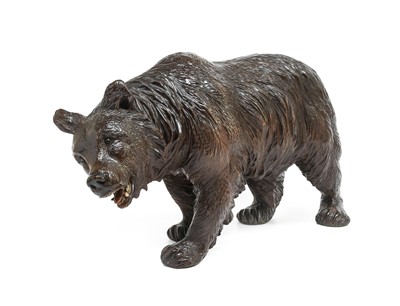 Lot 248 - A Black Forest Lindenwood Figure of a Bear,...