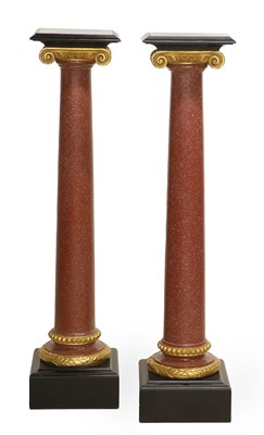 Lot 697 - A Pair of Faux Marble, Ebonised and...