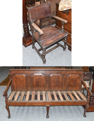 Lot 1317 - An 18th Century Panelled Oak Settle, with flat...