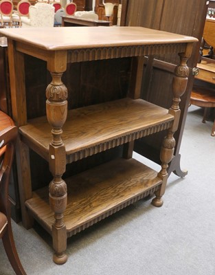 Lot 1219 - A Reproduction Oak Three Tier Buffet, nulled...