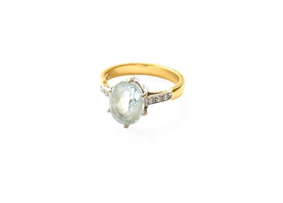 Lot 389 - An Aquamarine Ring, the oval cut aquamarine in...