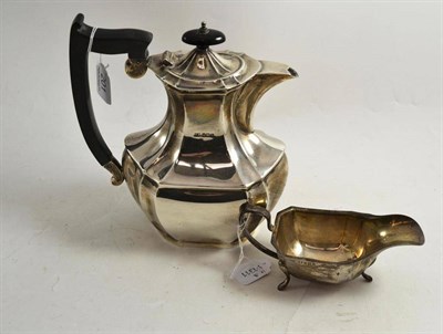 Lot 201 - Silver teapot, Sheffield 1951 makers mark EV and a similar cream jug (2)
