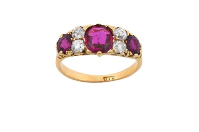 Lot 2208 - A Ruby and Diamond Ring three cushion cut...