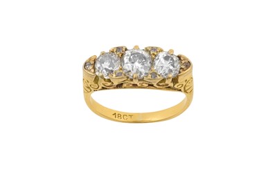 Lot 2216 - A Diamond Three Stone Ring the graduated old...