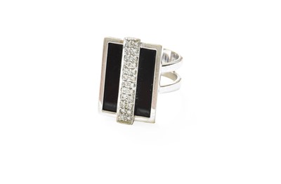 Lot 425 - An Art Deco Style Onyx and Diamond Ring, the...