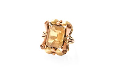 Lot 357 - A Citrine Ring, the emerald-cut citrine in a...