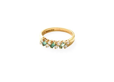 Lot 387 - An 18 Carat Gold Emerald and Diamond Half Hoop...