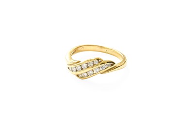 Lot 383 - An 18 Carat Gold Diamond Ring, comprising of...