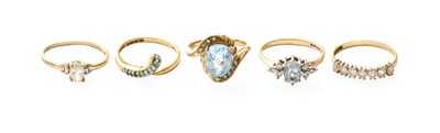 Lot 412 - Five Rings, comprising of blue topaz and...