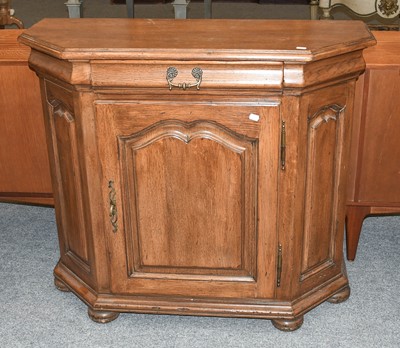 Lot 1293 - A Modern Oak Side Cabinet, with canted corners,...